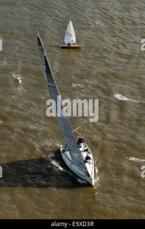 Vertical aerial view of a yacht on the river Tagus in Lisbon. Stock Photo