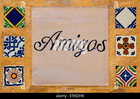 Horizontal close up of patterned tiles decorating a wall. Stock Photo