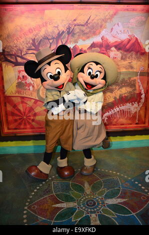 Mickey and Minnie Mouse share a kiss at Animal Kingdom, Walt Disney World, Orlando, Florida. Stock Photo