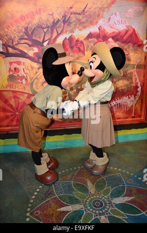 Mickey and Minnie Mouse share a kiss at Animal Kingdom, Walt Disney World, Orlando, Florida. Stock Photo