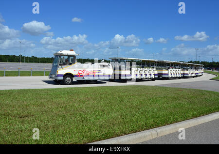 Disney Tram servicing the car park areas at Disney Florida. The tram collects and returns customer to and from the parking areas Stock Photo