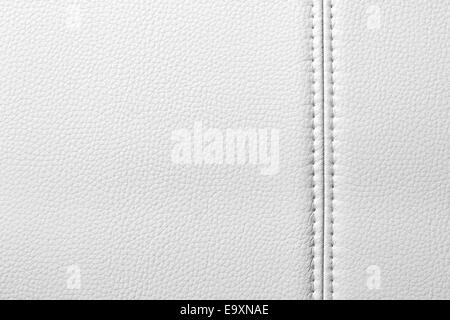 Texture of white leather, seam, close-up Stock Photo