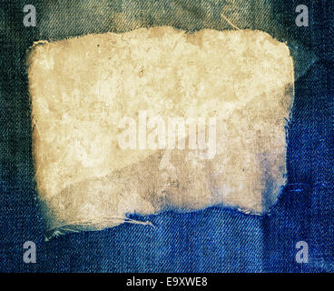 Blue torn jeans and fabric texture Stock Photo