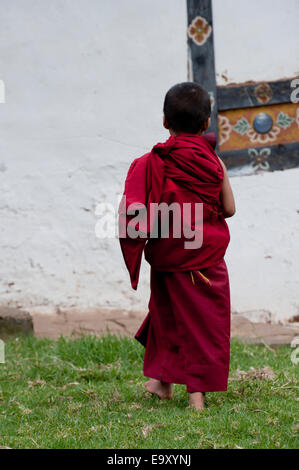 Monk in Chimi Lhakhang, Punakha District, Bhutan Stock Photo