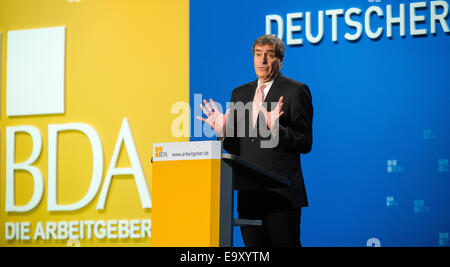 Berlin, Germany. 04th Nov, 2014. Employers' President Ingo Kramer speaks during the German Employers' Conference in Berlin, Germany, 04 November 2014. The annual conference serves as a place to exchange ideas between top representatives from politics, business and society. Photo: BERND VON JUTRCZENKA/dpa/Alamy Live News Stock Photo