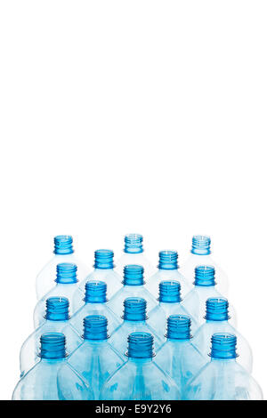Many empty plastic bottles isolated against a white background. Plastic waste Stock Photo