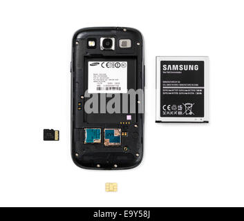 Samsung Android phone without the rear cover and removed battery, memory and SIM card isolated on white background Stock Photo