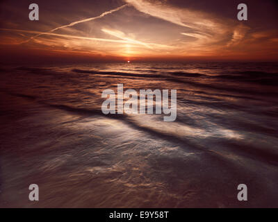 Beautiful dramatic sunset over lake Huron, Pinery Provincial Park, Grand Bend, Ontario, Canada. Stock Photo