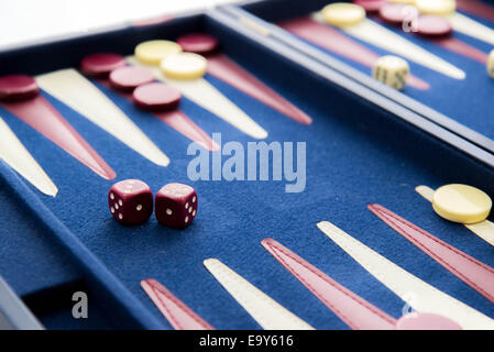 board games - red white and blue backgammon set in play Stock Photo