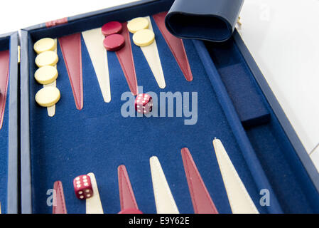 board games - red white and blue backgammon set in play Stock Photo