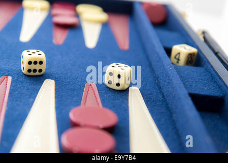 board games - red white and blue backgammon set in play Stock Photo