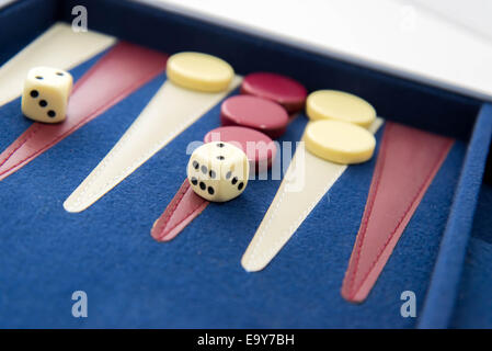 board games - red white and blue backgammon set in play Stock Photo