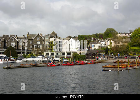 Hire rowing and motor boats of Windermere Lake Cruises Ltd. tied up at the jetties on Lake Windermere at Bowness-on-Windermere. Stock Photo