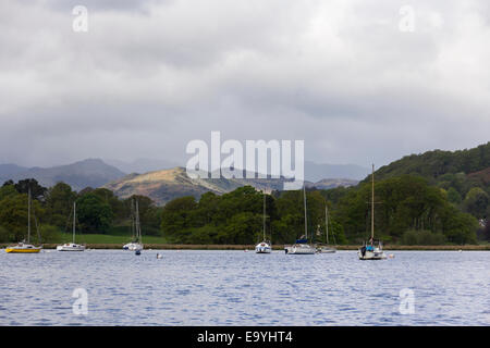 The north end of Lake Windermere looking west from Waterhead on a dull day with occasional rain. Black Fell is centre left. Stock Photo