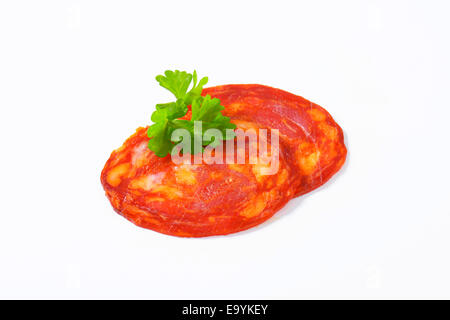 Spanish sausage seasoned with smoked pimenton - thin slices Stock Photo