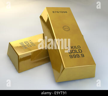 Two Gold bars on a white background Stock Photo - Alamy