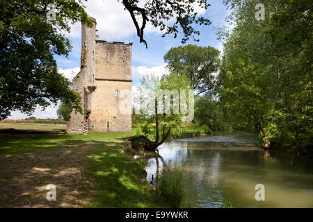 The picturesque ruins of Minster Lovell Hall standing on the banks of the River Windrush, Minster Lovell, Oxfordshire UK Stock Photo