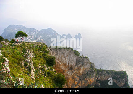 View of Capri island, off the southern coast of Italy on a cloudy day. Capri Island, Tyrrhenian Sea, Sorrentine Peninsula, Italy Stock Photo