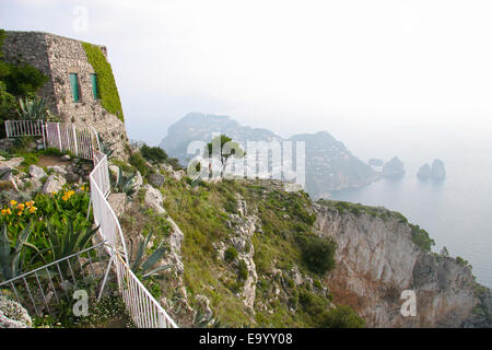 View of Capri island, off the southern coast of Italy on a cloudy day. Capri Island, Tyrrhenian Sea, Sorrentine Peninsula, Italy Stock Photo