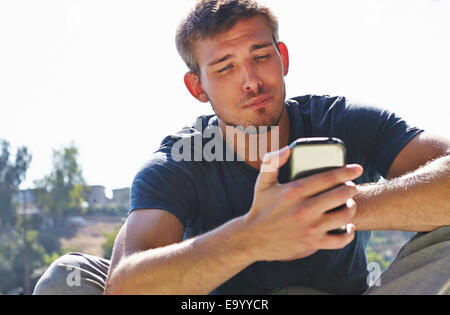 Man using smartphone Stock Photo