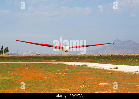 Alexander Schleicher ASK7m two seat training glider of the Cyprus Gliding group coming in to land at Mammari airstrip, Nicosia, Cyprus. Stock Photo