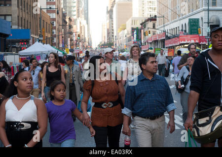 Crowds clog Broadway in Times Square after the city began closing sections of the street. Traffic was diverted to Seventh Avenue Stock Photo