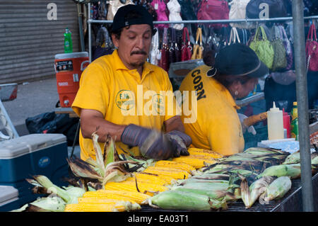 Tammales seller in Broadway Avenue. Manhattan. NY. Crowds clog Broadway in Times Square after the city began closing sections of Stock Photo