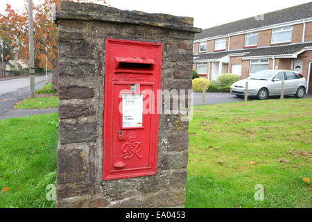 Red British post box in Winterbourne, South Gloucestershire. 19 October 2014 Stock Photo