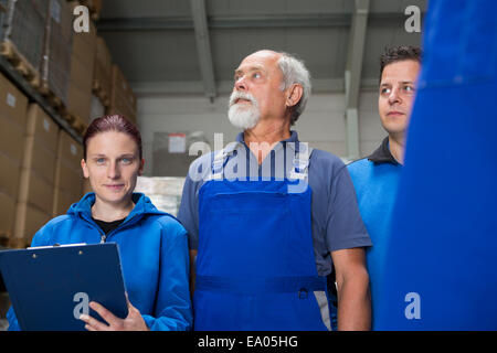 Portrait of team of factory workers Stock Photo