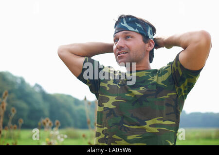 Paintball player in combat gear Stock Photo