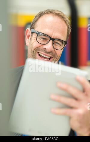 Businessman using digital tablet Stock Photo