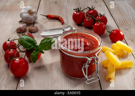 Composition of ingredients for the preparation of tomato sauce in the Italian manner Stock Photo