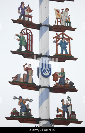 A maypole decorated with figures of different occupations in Rott am Inn, Bavaria, Germany. Stock Photo