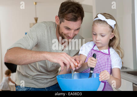 Father and daughter baking Stock Photo