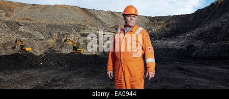 Portrait of mature quarry worker in quarry site Stock Photo