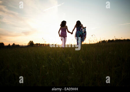 Girls playing on field, Sarsy village, Sverdlovsk region, Russia Stock Photo