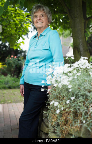 Senior woman in garden Stock Photo