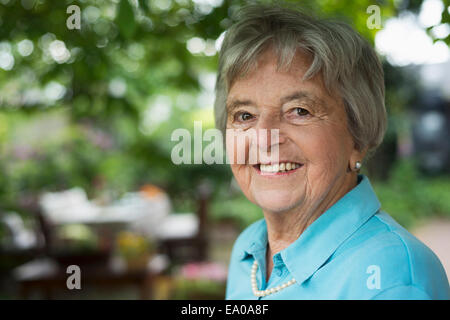 Senior woman in garden Stock Photo