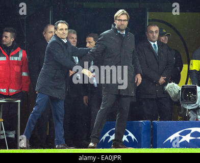 Dortmund, Germany. 04th Nov, 2014. Dortmund's trainer Juergen Klopp (R) with Istanbul's trainer Cesare Prandelli after the Champions League match between Borussia Dortmund and Galatasray Istanbul at the BVB Stadium in Dortmund, Germany, 04 November 2014. Photo: Bernd Thissen/dpa/Alamy Live News Stock Photo