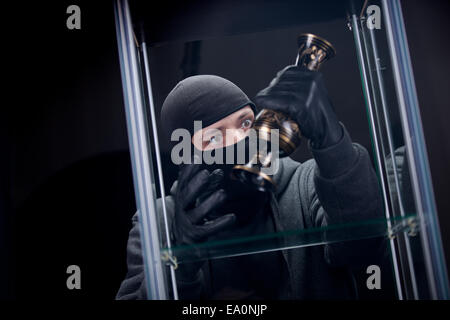 burglar wearing black mask Stock Photo