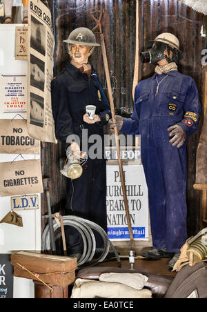 The Land of Lost Content , a museum of 20c British popular culture, Craven Arms, Shropshire, UK. Wartime civil defence uniforms Stock Photo