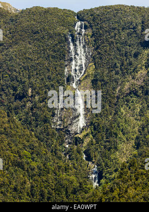 Waterfall in Doubtful Sound in New Zealand Stock Photo