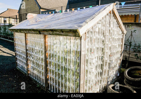 Greenhouse made entirely of recycled drinks bottles. Stock Photo