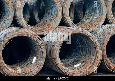 Steel wire coils in storage Stock Photo