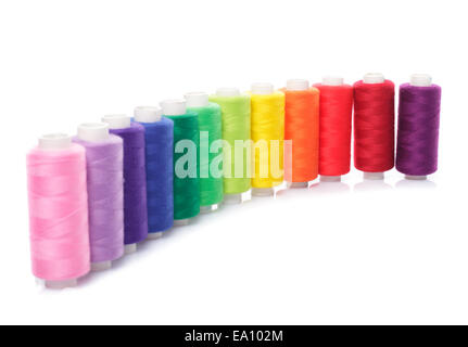 Sewing multicolored  threads isolated on a white Stock Photo