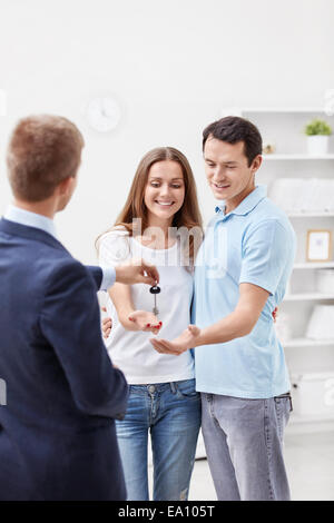 The consultant gives the key Stock Photo