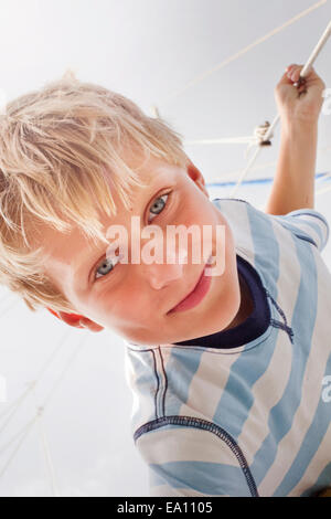 Portrait of boy on sailboat Stock Photo