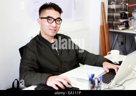 Portrait of male architect at office desk Stock Photo