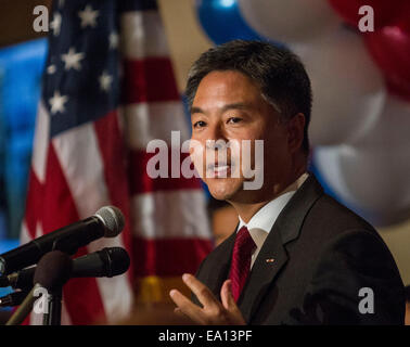 Los Angeles, USA. 4th Nov, 2014. Democratic Party California State Senator Ted W. Lieu speaks with his supporters during an election night party in Los Angeles, the United States, Nov. 4, 2014. Ted W. Lieu was the third Chinese American to be elected as U.S. Congressman during this year's U.S. midterm elections. © Zhao Hanrong/Xinhua/Alamy Live News Stock Photo