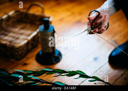 Woman working on plant cuttings